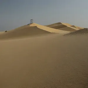 Sahara Sands: Majestic Dunes Under Moroccan Sun