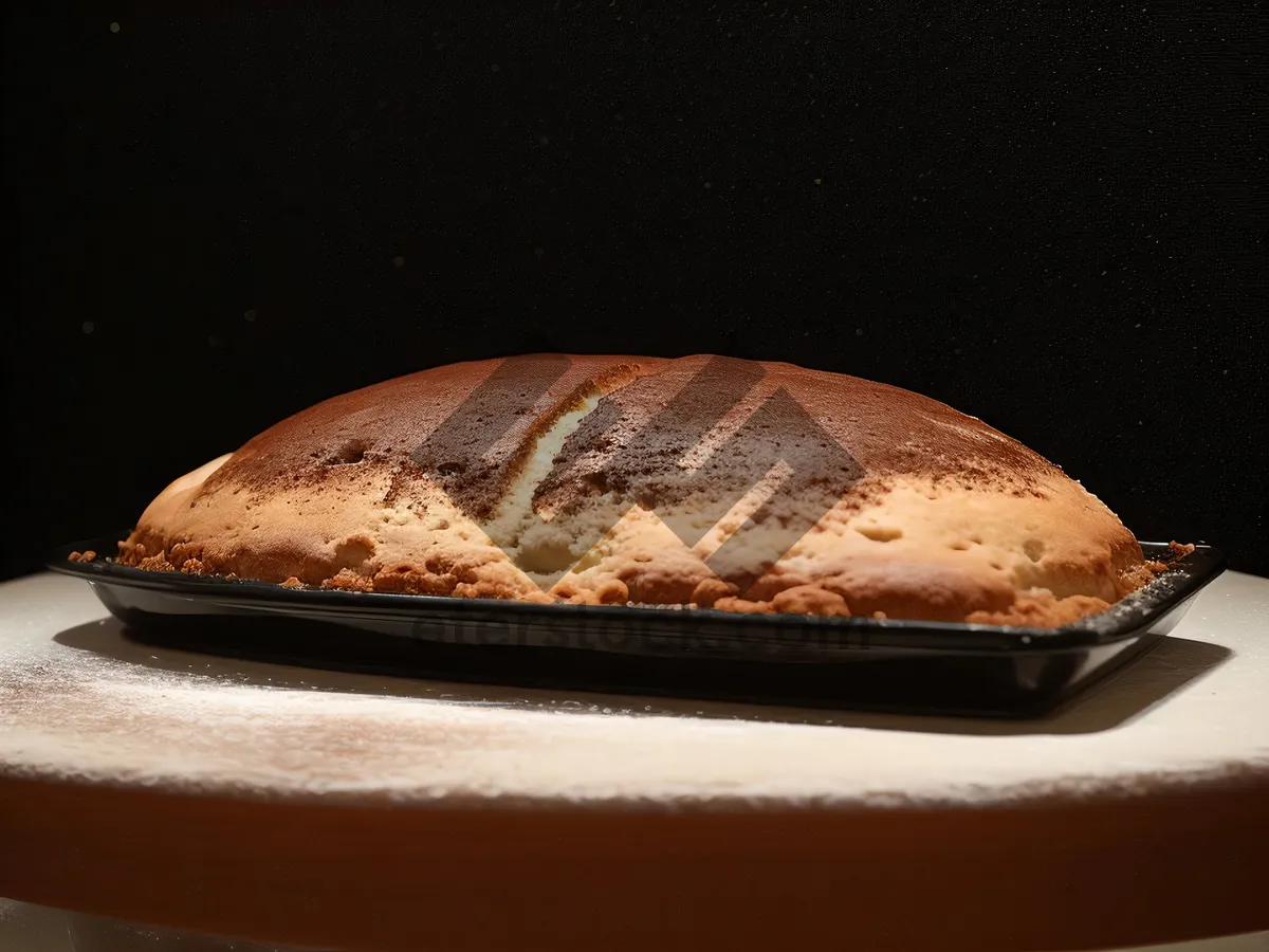 Picture of Fresh baked bread and cappuccino for breakfast meal.