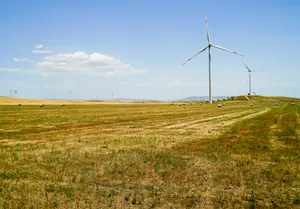 Renewable Energy Wind Farm Landscape Under Summer Sky