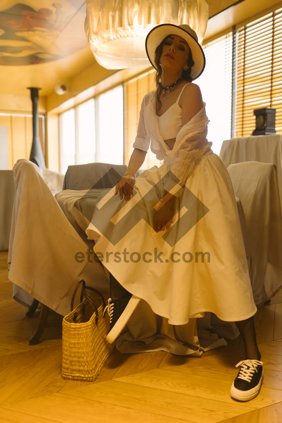 Picture of Happy bride in white wedding gown with bouquet