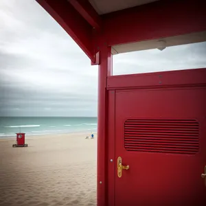 Column by the Sea - A Beachside Mailbox Amidst Oceanic Views