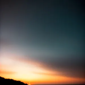 Vibrant Summer Sunset Over a Clear Horizon