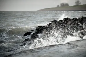 Rocky Shoreline Waves on Summer Day