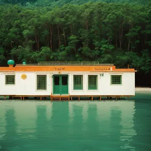 Scenic Coastal Architecture: Waterfront Boathouse & Shed