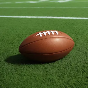 Rugby Ball on Green Grass: Sport Equipment for Game