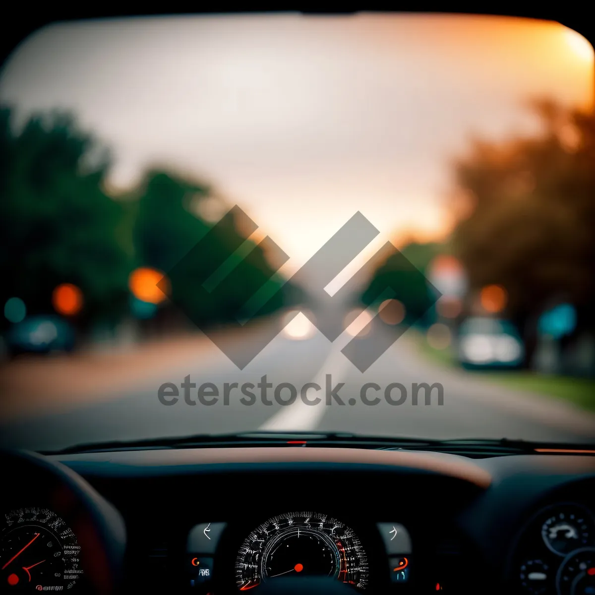 Picture of Speedometer and Steering Wheel in Car Interior