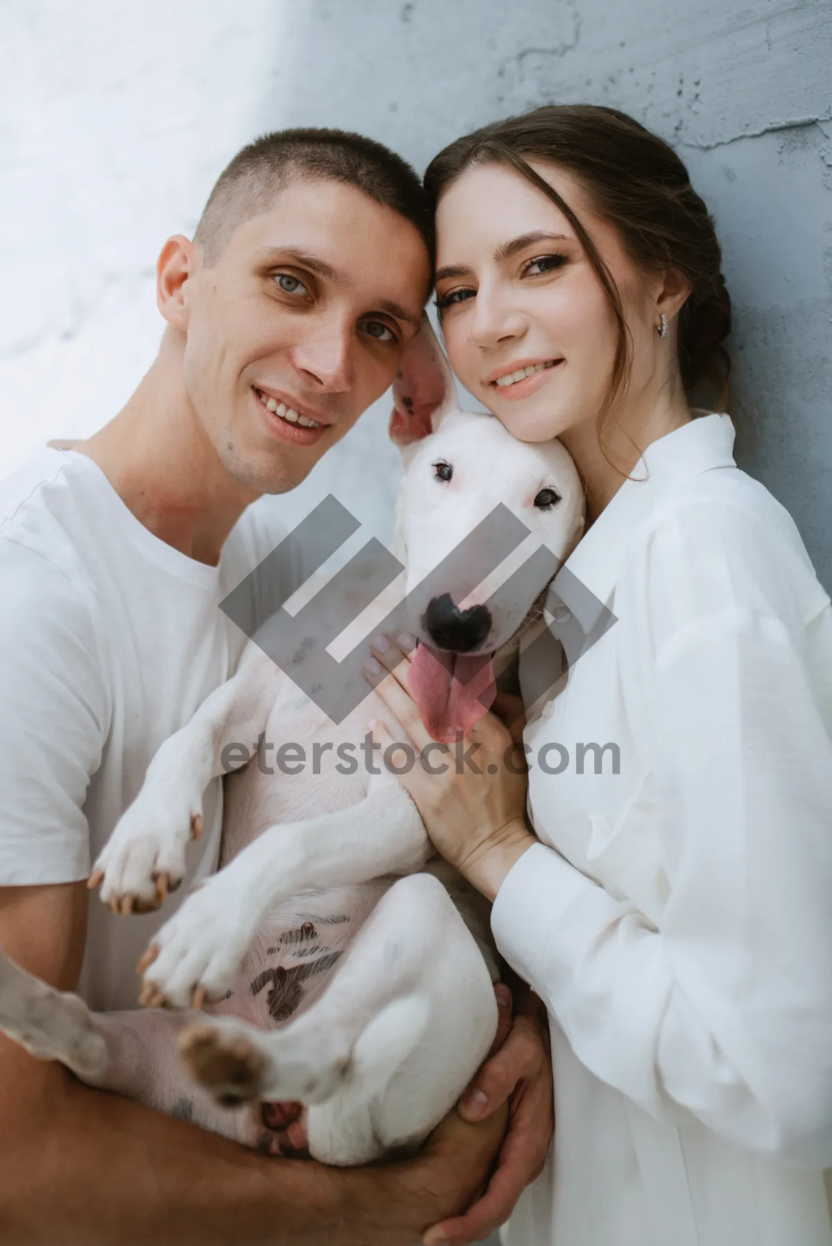 Picture of Happy man with cute Borzoi dog.