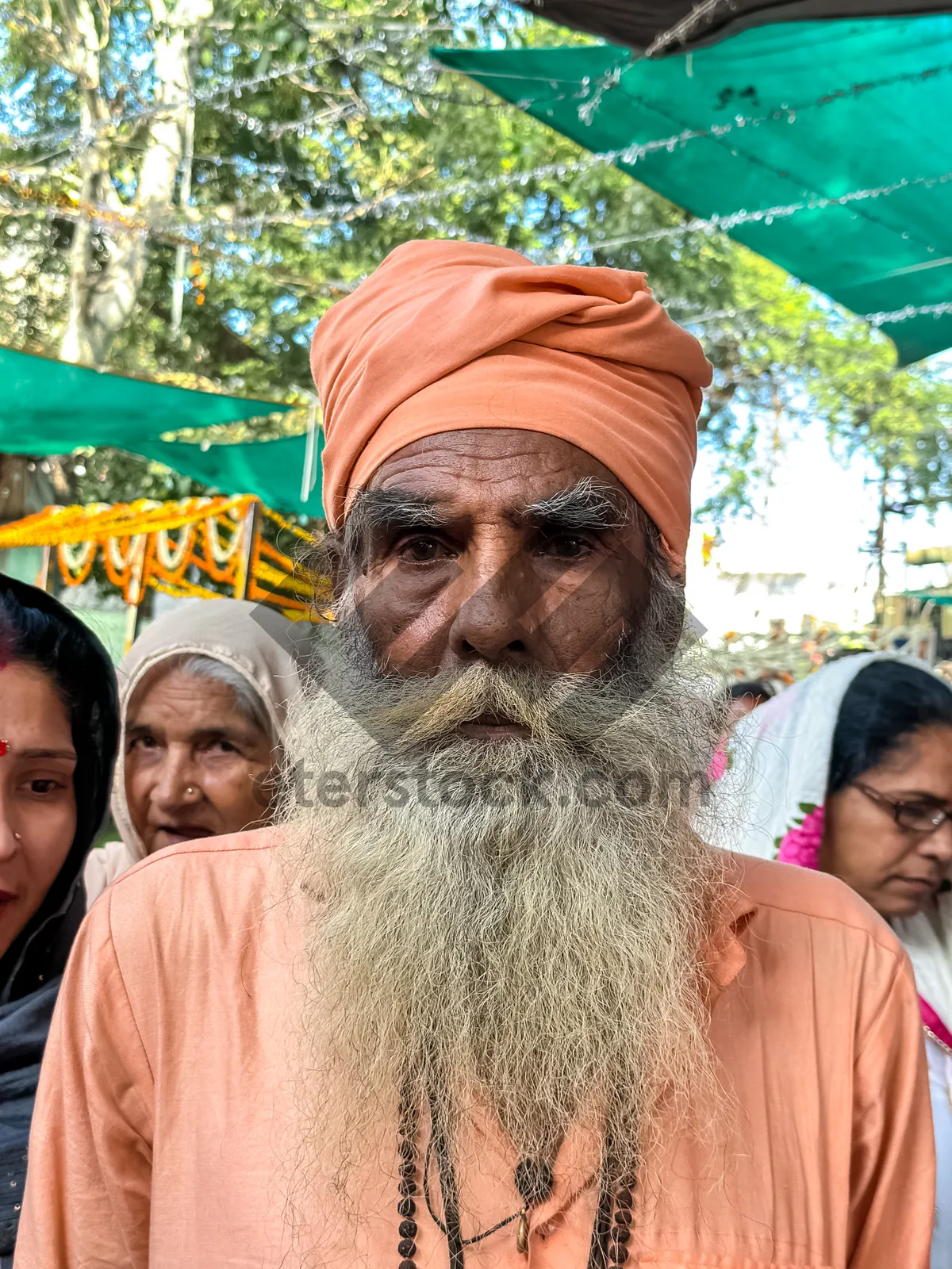 Picture of Happy elderly couple outdoor together smiling.