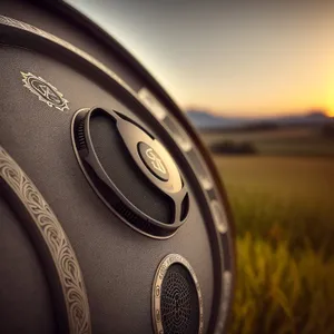 Modern Black Digital Camera Lens Cap - Close-Up Shot