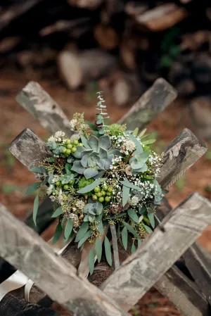 Spring bridal bouquet with flowers and leaves decoration.