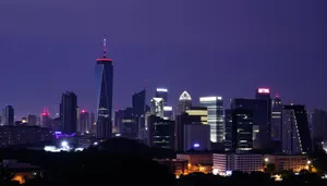 Modern High-Rise Office Tower in City at Night