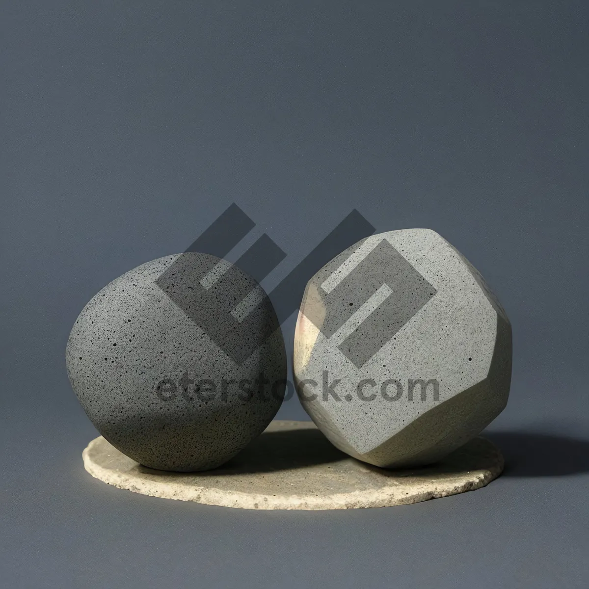 Picture of Close-up of Sports Equipment: Egg Ball, Stone Dumbbell.