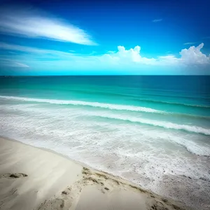 Serene Sunset over Turquoise Coastal Waves