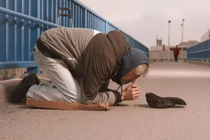 Person with sleeping bag in bag