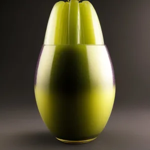 Yellow Fruit in Glass with Candle
