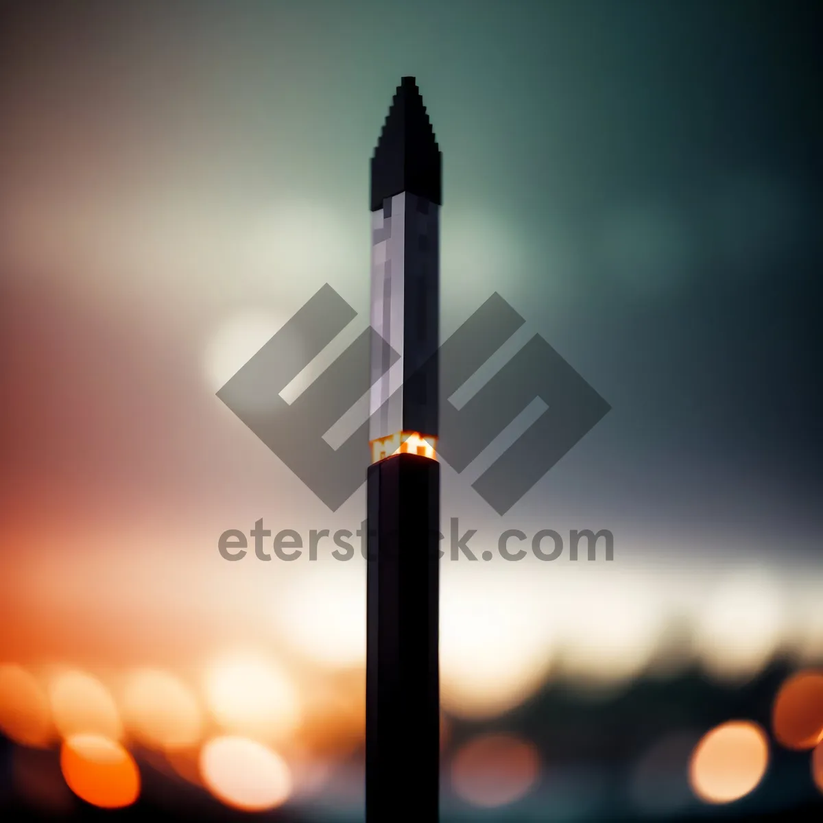 Picture of Pencil and Torch on Desk