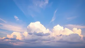 Vivid Summer Sky with Fluffy Clouds and Sun