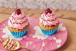 Delicious Strawberry Cake with Cream and Berries