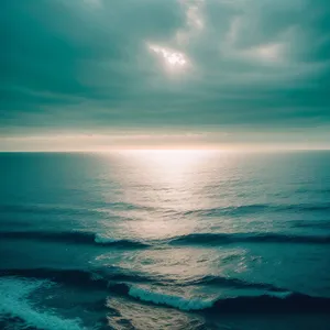 Sunny Beach Paradise: Tranquil turquoise seascape with sandy shore.