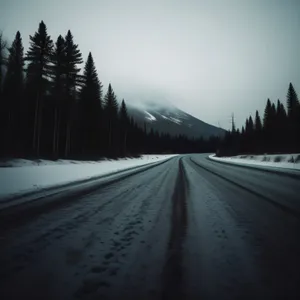 Scenic Mountain Highway Under Clear Skies