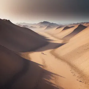 Dry Desert Adventure: Majestic Orange Dunes under the Hot Sun