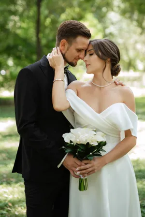 Happy Groom and Bride Celebrating Outdoors