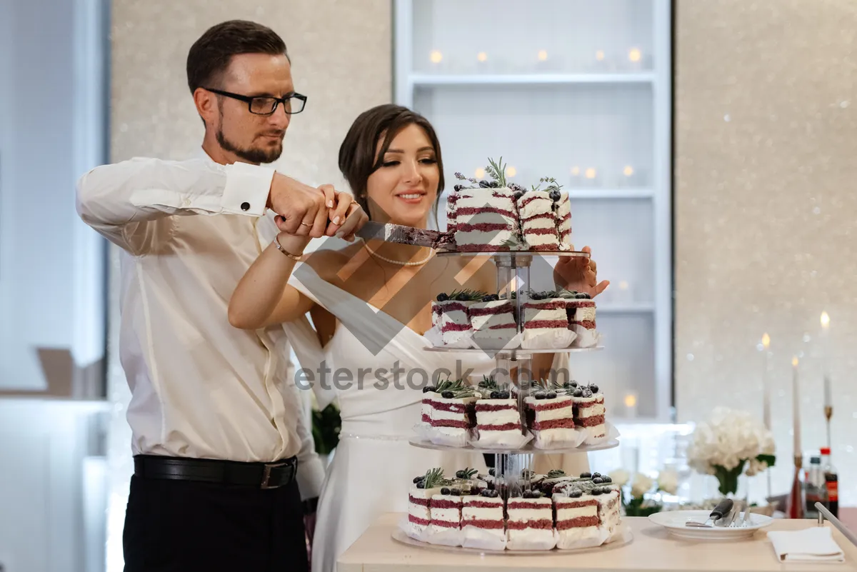 Picture of Happy Male Waiter Smiling at Business Meeting Indoors