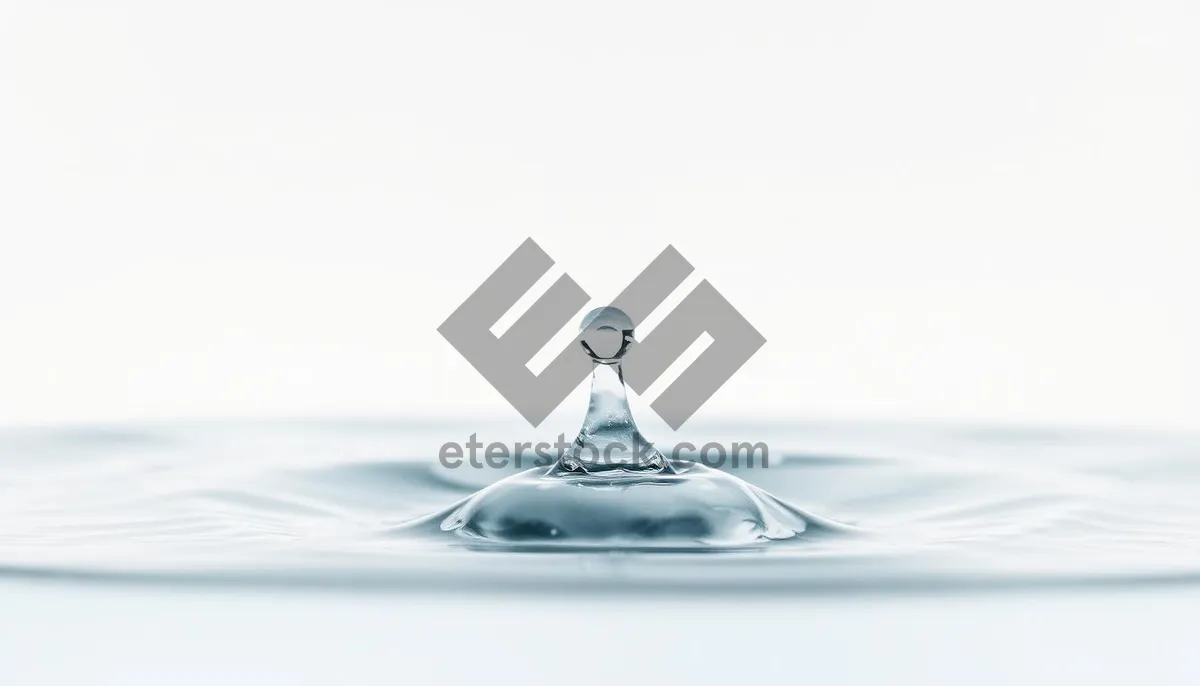 Picture of Clear glass water faucet with reflection on clean surface