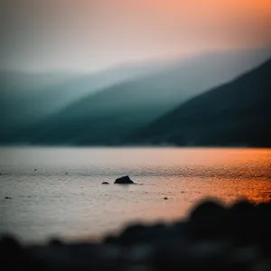 Serene Sunset Over Tranquil Ocean