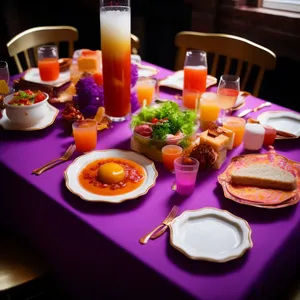 Gourmet meal on elegant dining table with candlelight