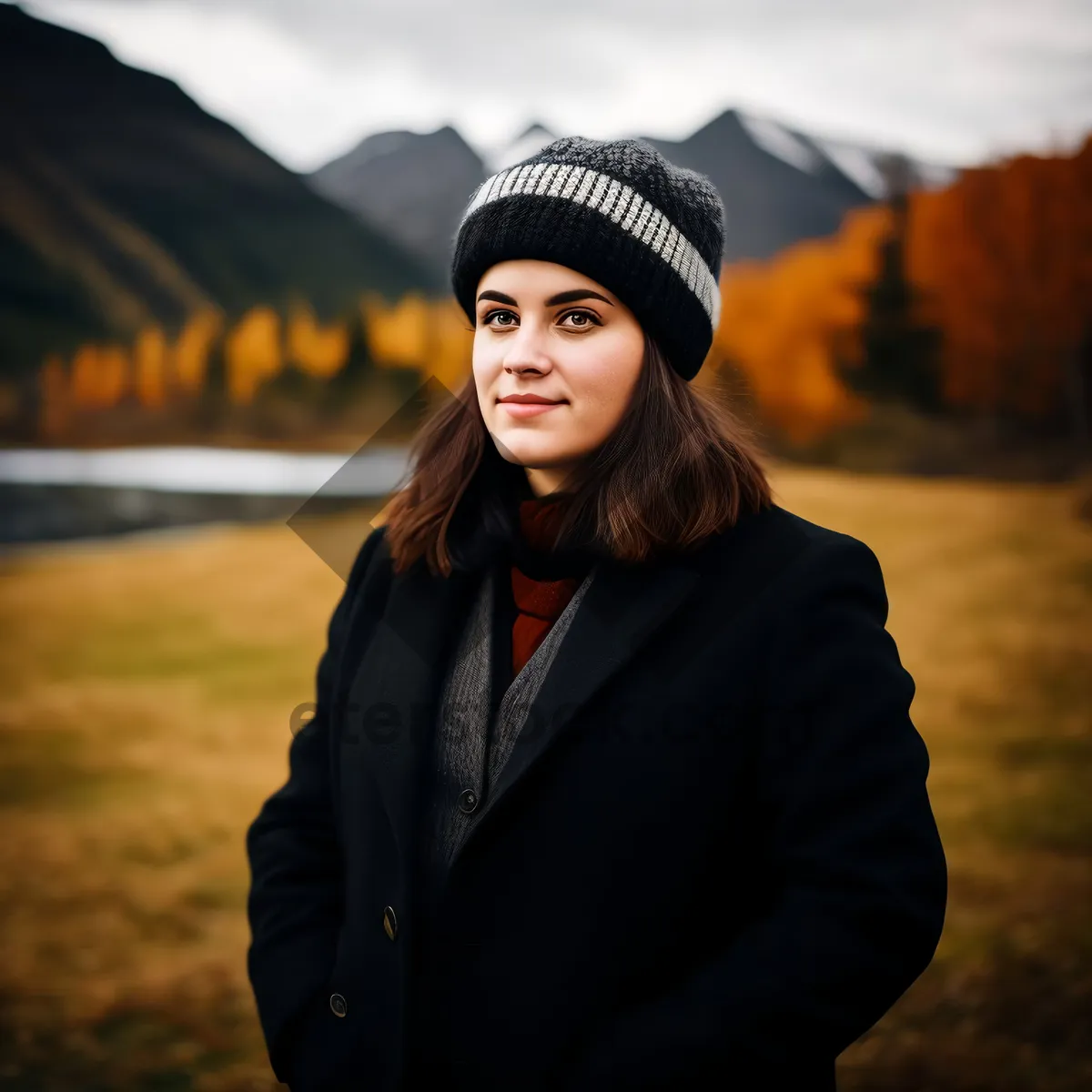 Picture of Attractive Caucasian woman in business suit smiling outdoors.