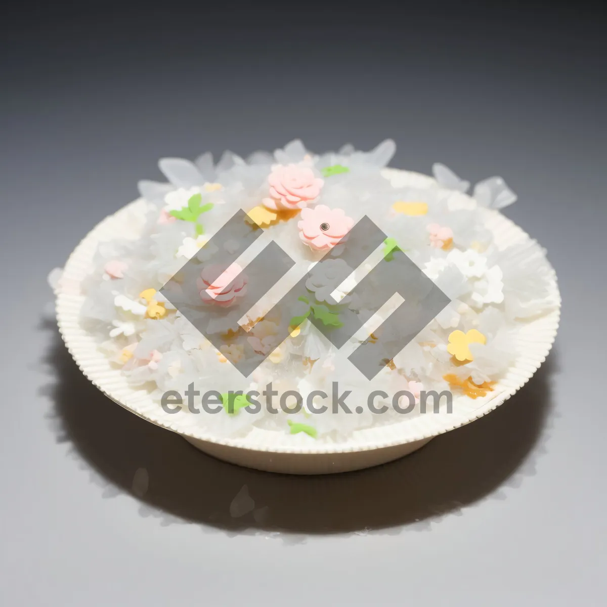 Picture of Pink birthday cake with cream frosting and sprinkles.