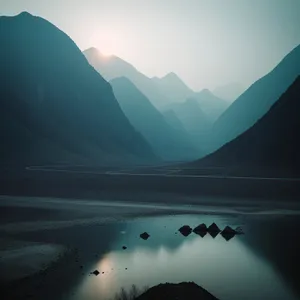 Serenity at Sunset: Majestic Mountains Painted in Gold