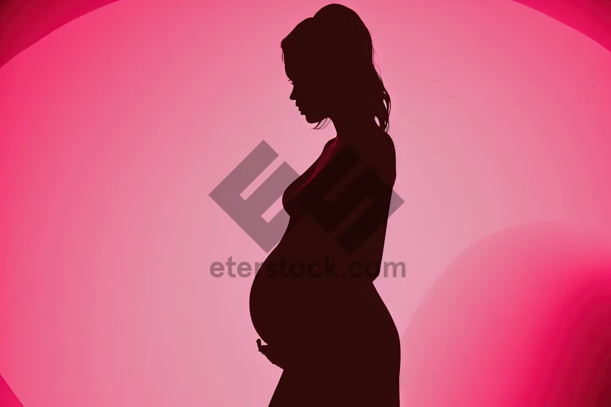 Picture of Silhouette of a Black Woman and Man’s Belly