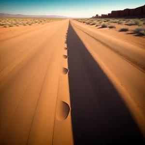 Desert Horizon: Wings Soaring Through Landscape