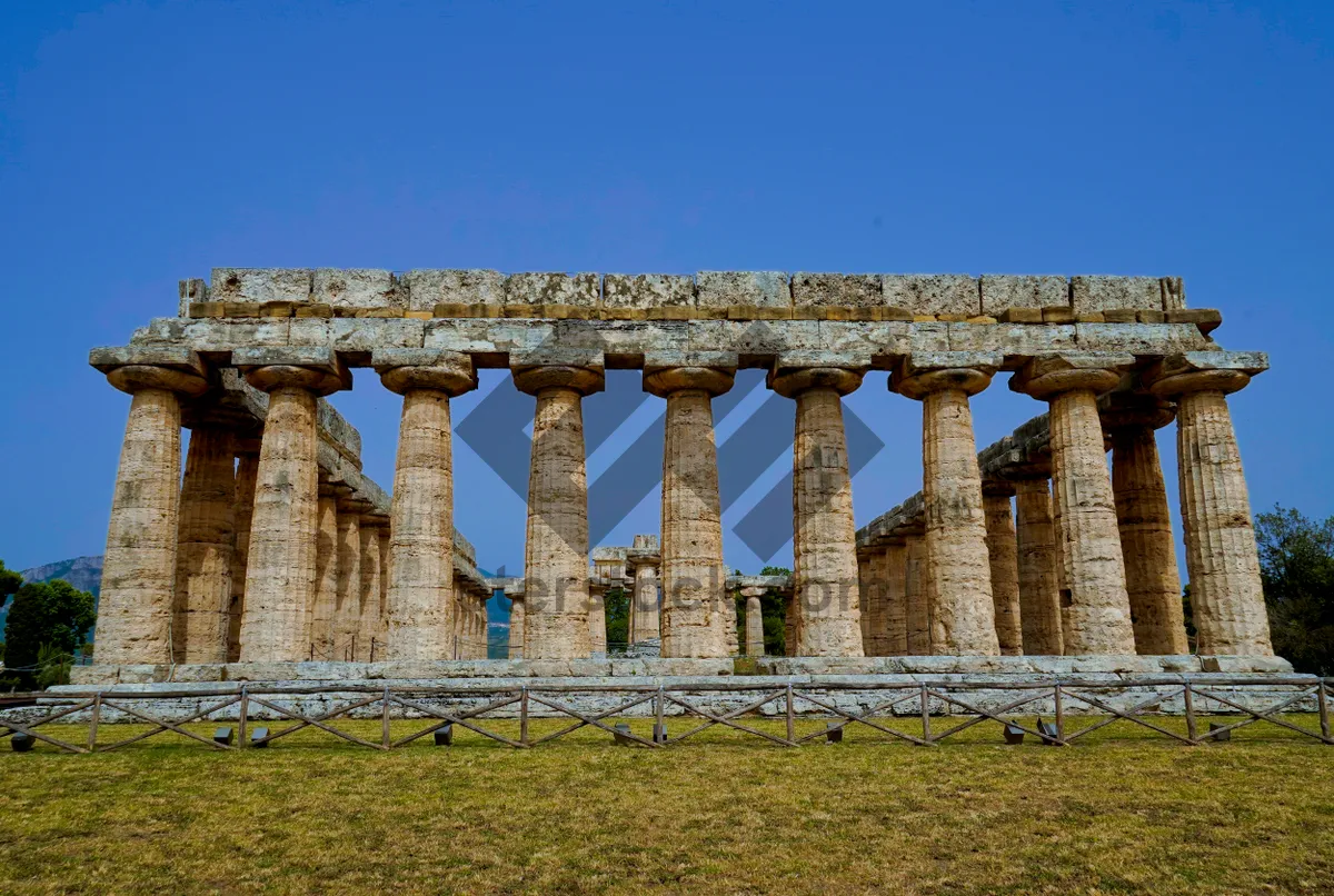 Picture of Ancient Roman Temple Columns in Historic City Skyline