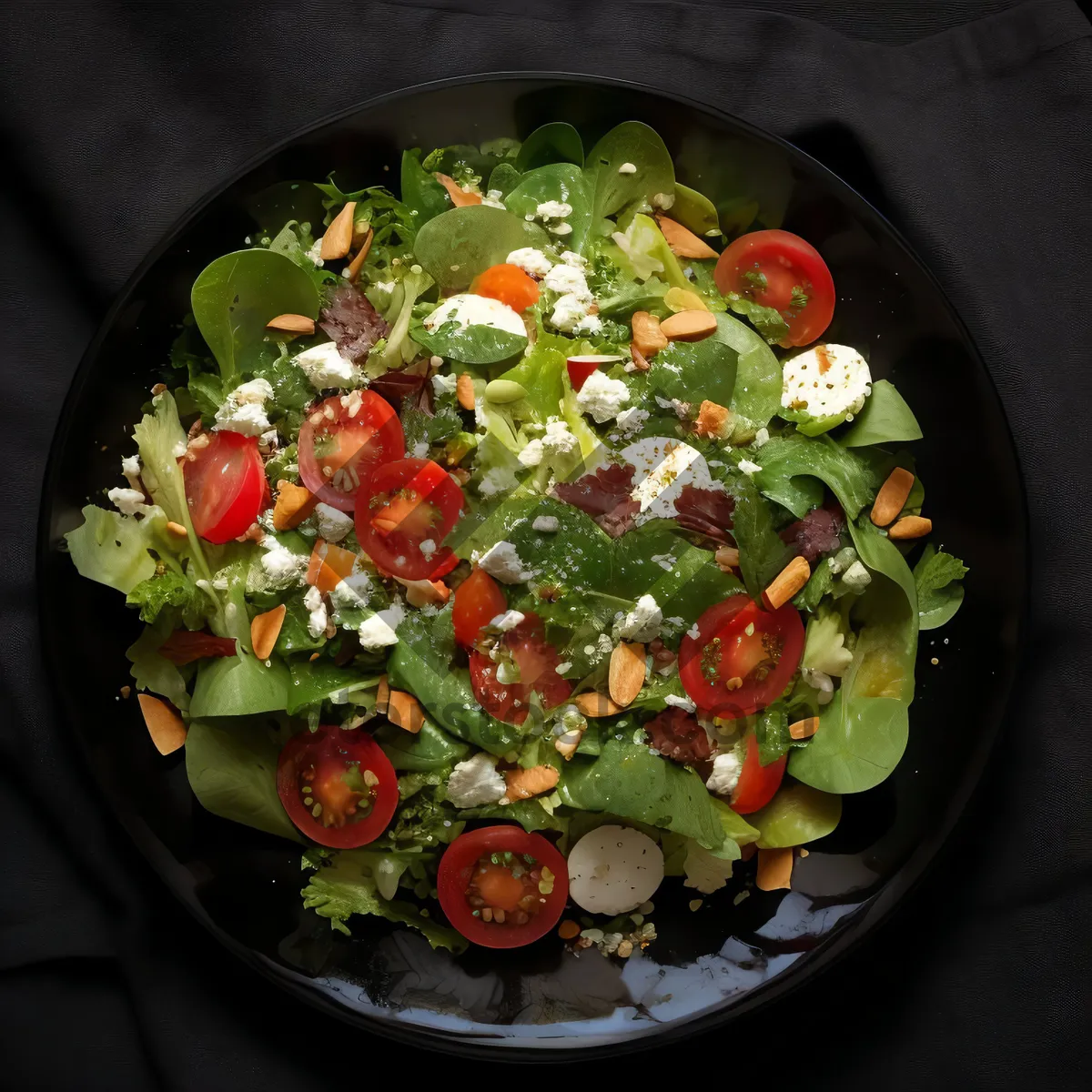 Picture of Gourmet vegetable salad with fresh tomatoes and olives