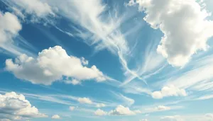 Summer Sky with Fluffy Clouds and Bright Sun