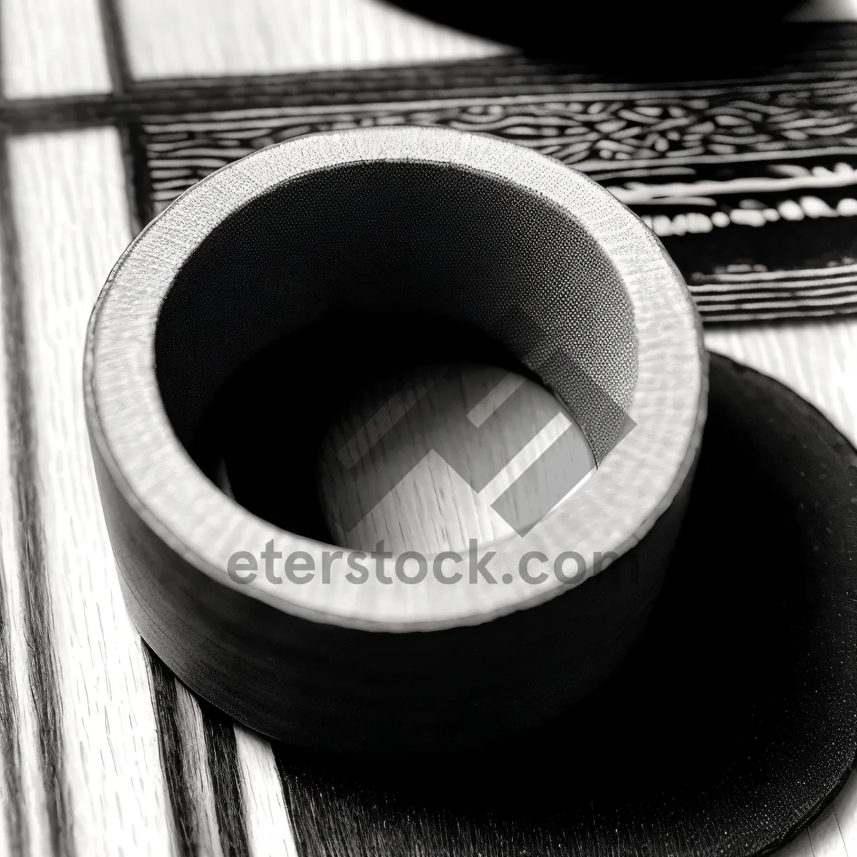 Picture of Black Coffee Cup on Coiled Structure