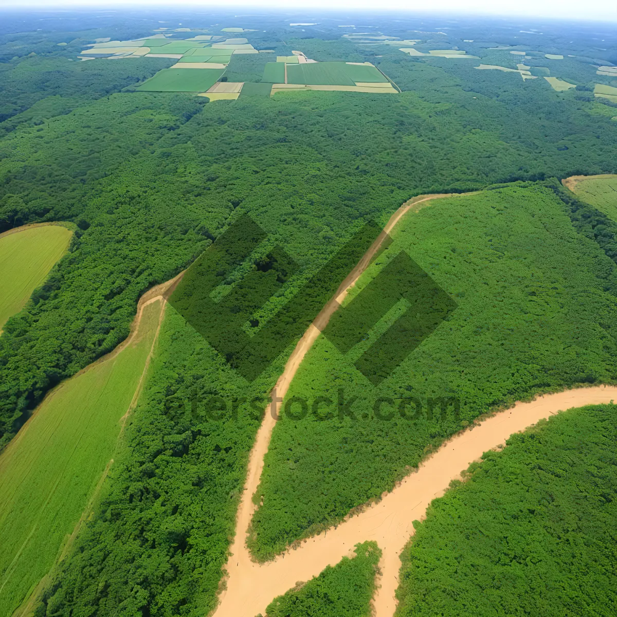 Picture of Vibrant rural landscape with rolling hills and clear skies.