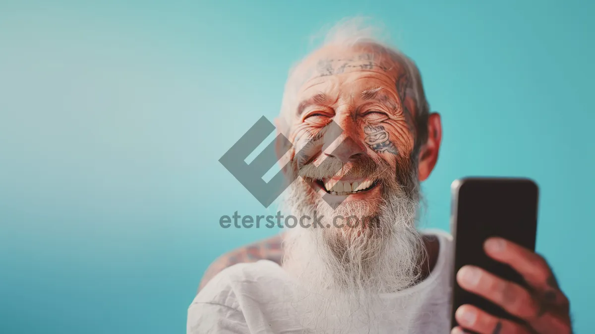 Picture of Happy elderly couple smiling together in retirement portrait.