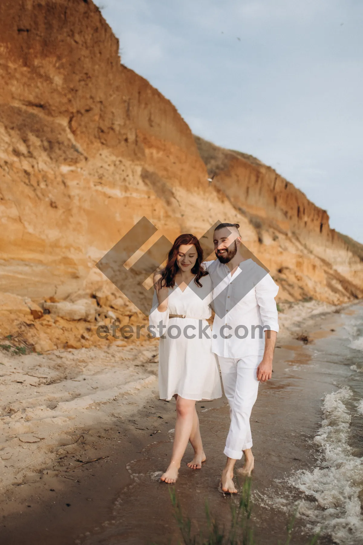 Picture of Man standing on cliff with scenic view