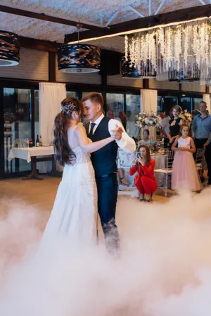 Happy bride and groom celebrating wedding day