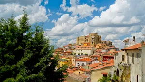 City skyline with ancient church and castle towers.