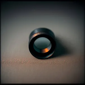 Shiny Black Lens Cap Control Mechanism