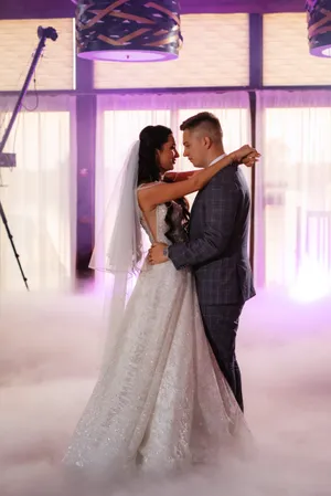 Happy bride and groom celebrating romantic wedding day