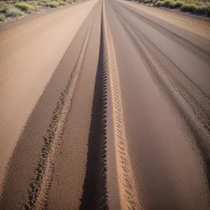 Endless Road: A Scenic Drive through Sandy Deserts
