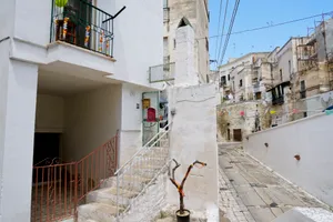 Historic church tower in city skyline landmark.