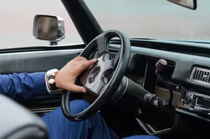 Modern car interior dashboard, steering wheel and gearshift