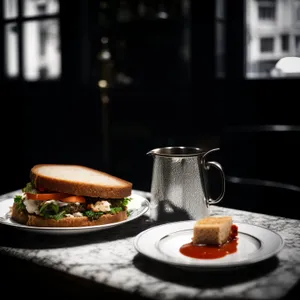 Hot breakfast meal on plate with coffee cup.